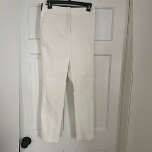 White Zara pants with black stretch wait band at back slit leg.